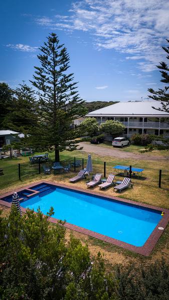 Swimming pool and loungers