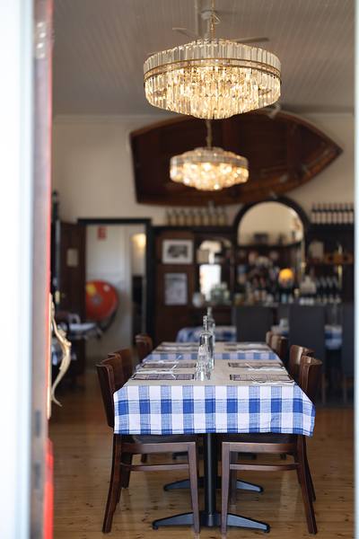 Lido Cucina, crystal chandeliers and Italian table settings